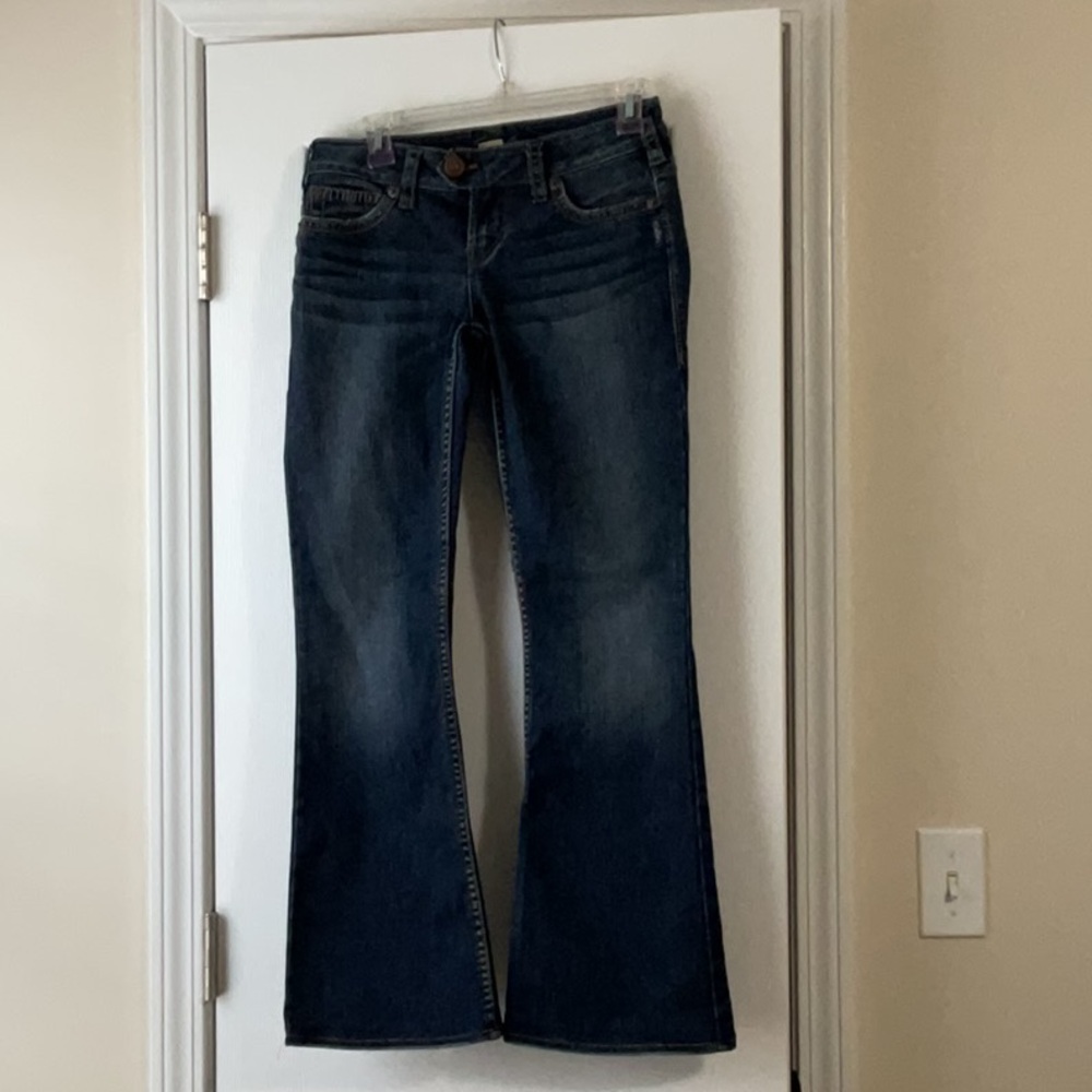 Buckle Silver low rise boot cut jeans size 3-4 US, Buckle size 27.